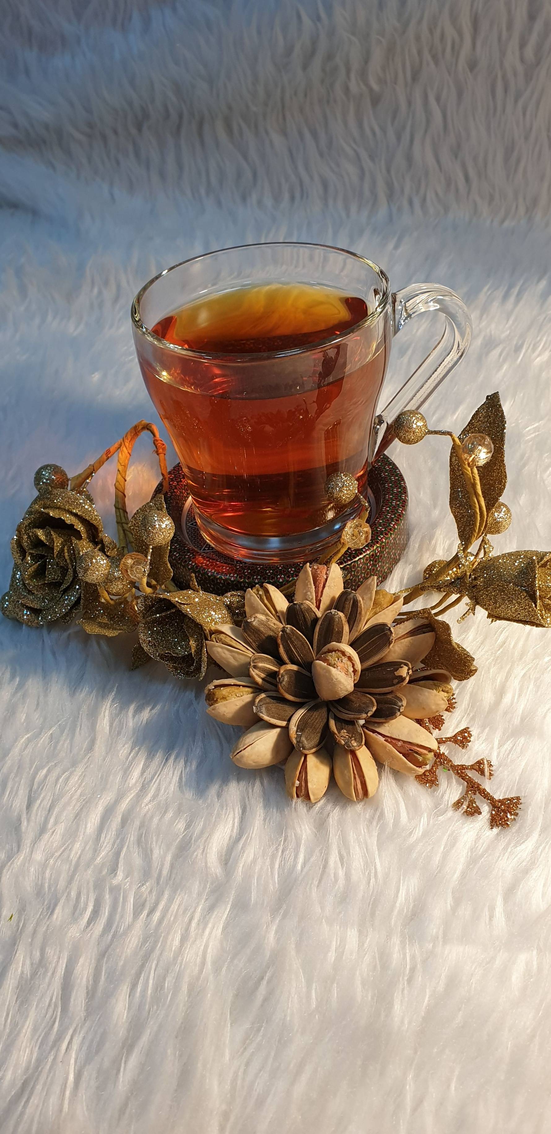 ضيافة فستق وفصفص دوار الشمس على شكل زهرة