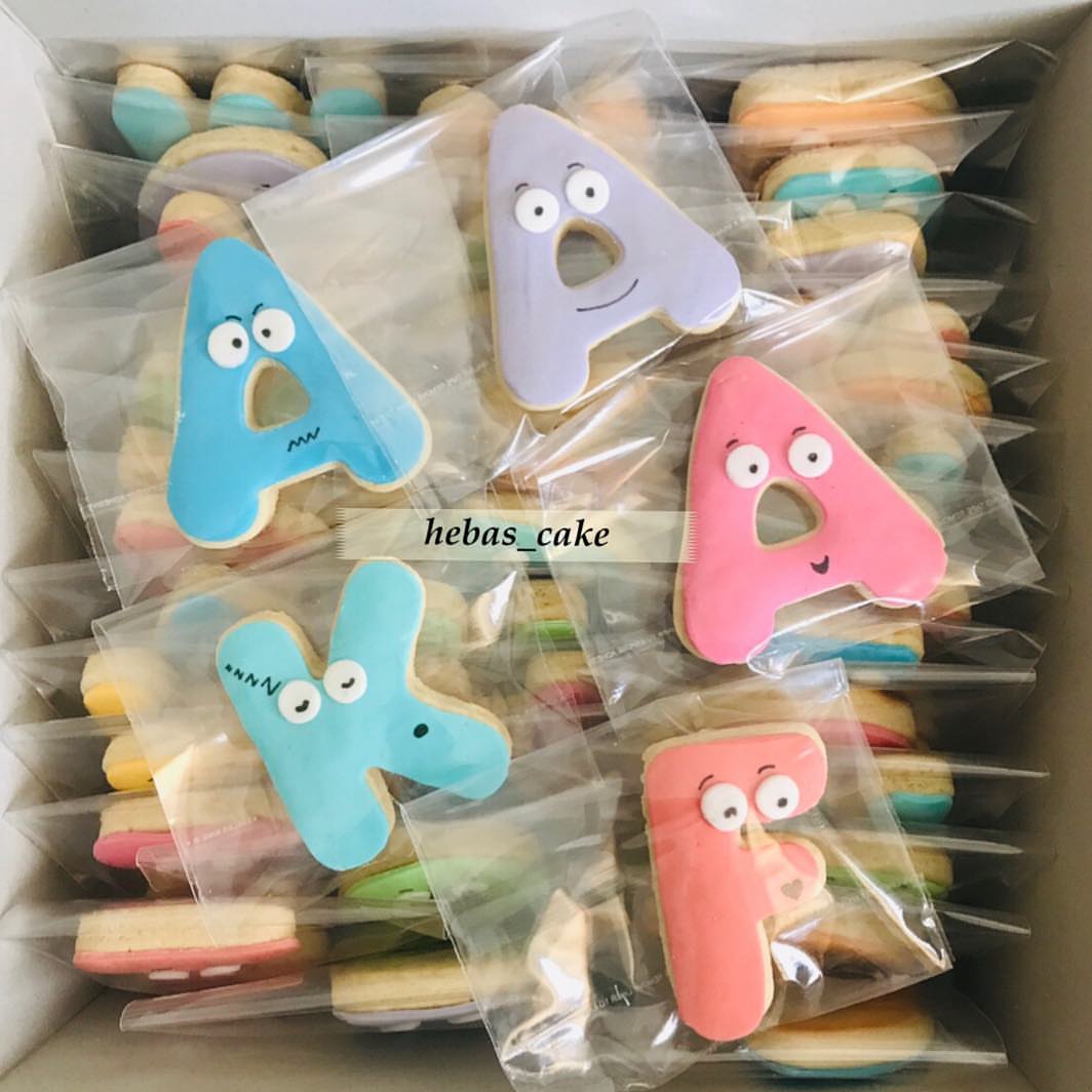 #cakes #cookies #sugarcookiesofinstagram #letters #face #creativecookies #uae #abudabi #