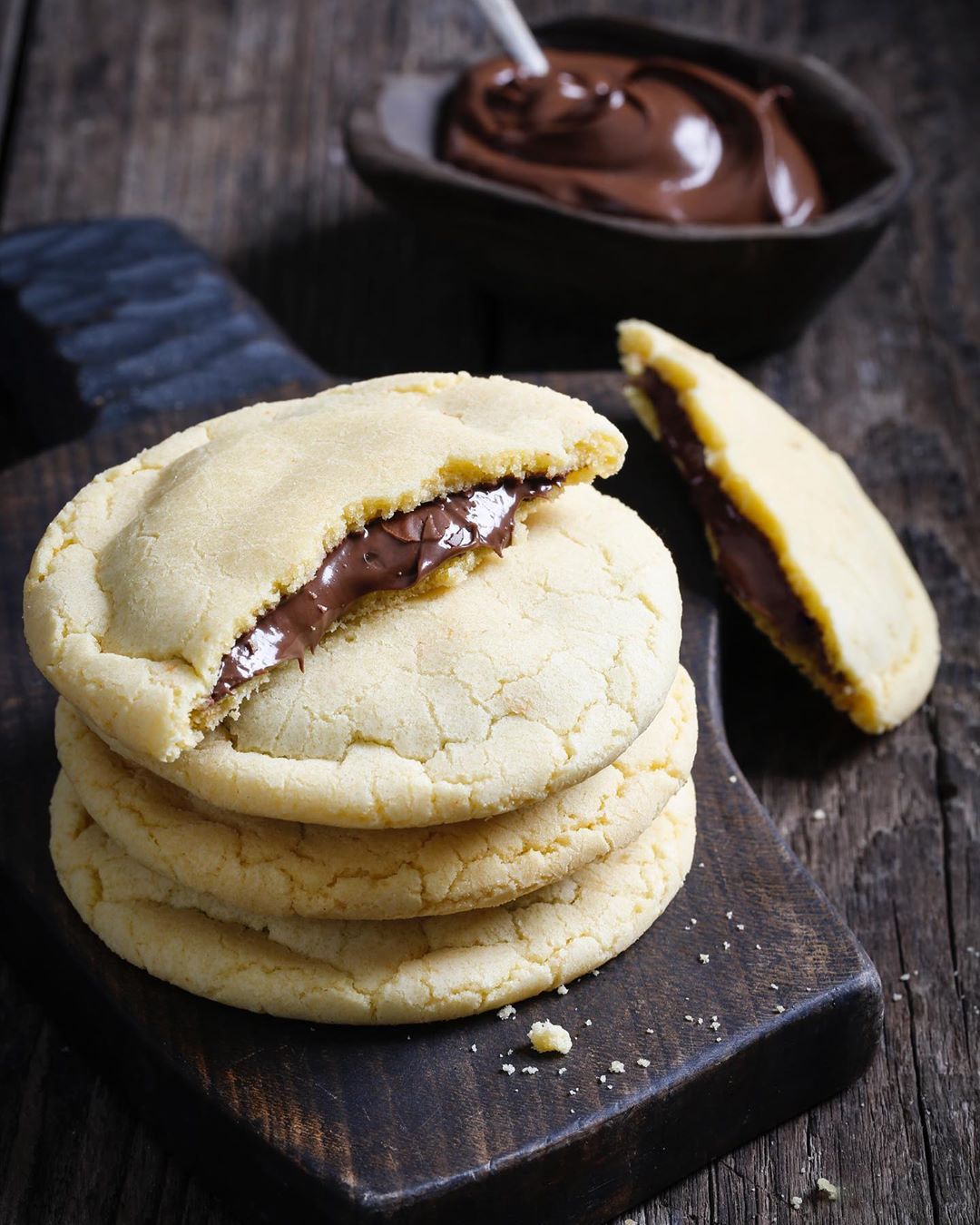 Have you tried these yet Our classic Nutella filled cookies! Pure dose of happiness ❤️ for orders contact us through WhatsApp or Talabat