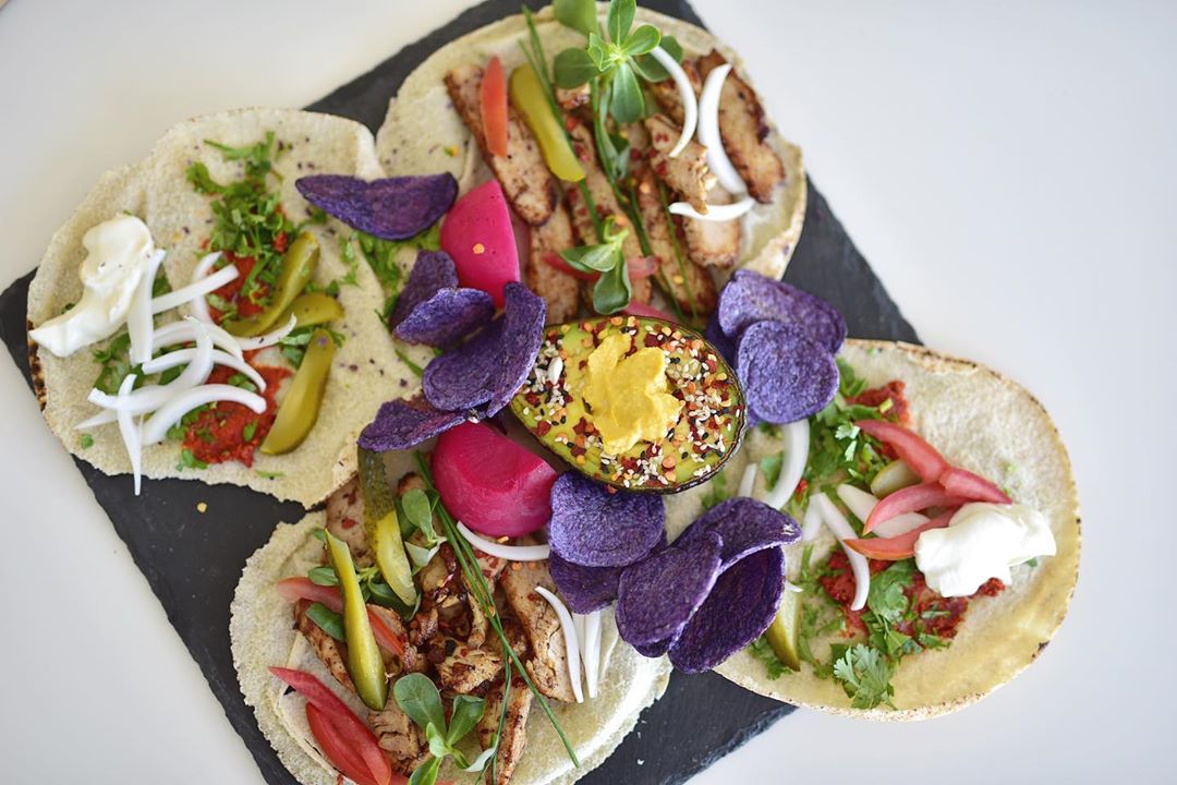 A fresh addition to our Ramadan menu: chicken shawarma with lean strips of chicken dressed with vegetables and a creamy sauce. …Served with colorful purple potato chips The perfect bite for your next Suhoor. ✨