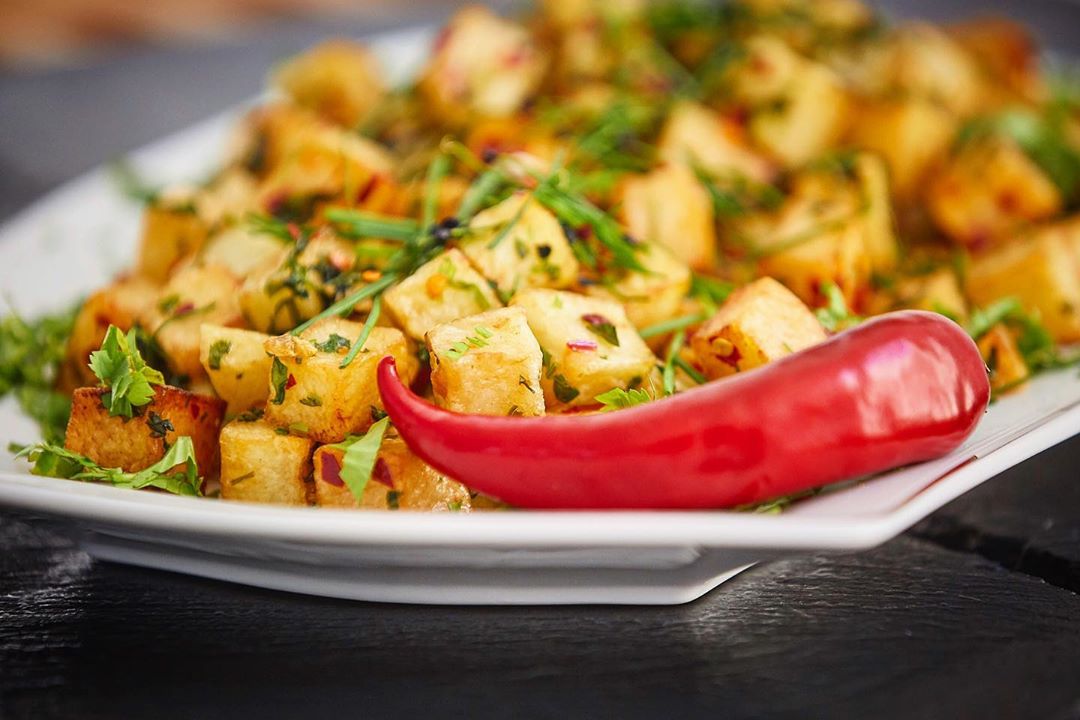 Add a touch of exotic flavor to your Iftar with our batata harra… crunchy on the outside and buttery soft on the inside. Full menu on the link: www.faitmaisoncuisine.com