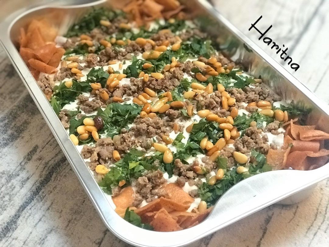 Fattit bitinjan (layers of fried Aubergine, bread, meat and yogurt) £13 1kg فتة الباذنجان #haritna #haritna_london #fattie #makdous_fatteh #aubergine #syrianfood #lebanonfood #lebanoncuisine #authenticfood #syriancuisine #halal #homemadefood #حارتنا #حارتنا_لندن #فتة_باذنجان #فتة_مكدوس #فتة #اكلات_سورية